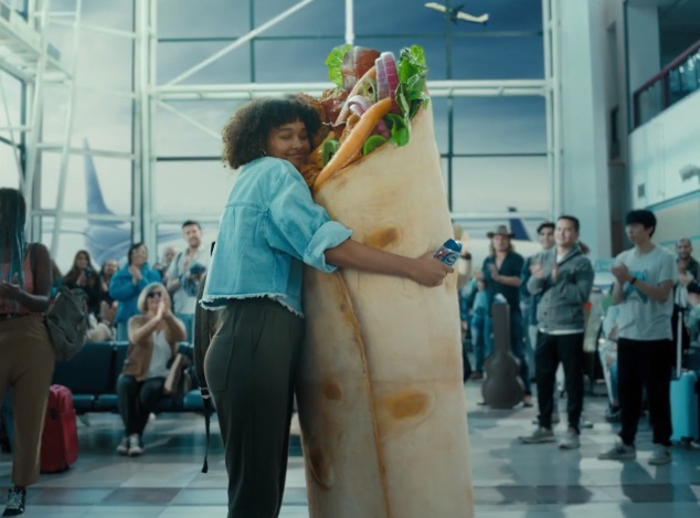 TUMS Love Food Back Commercial - Feat. Woman Embracing Chicken Wrap in Airport